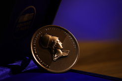Metal medal with the inscription of the French Academy of Sciences - Institute of France, and the bust of a woman’s head.